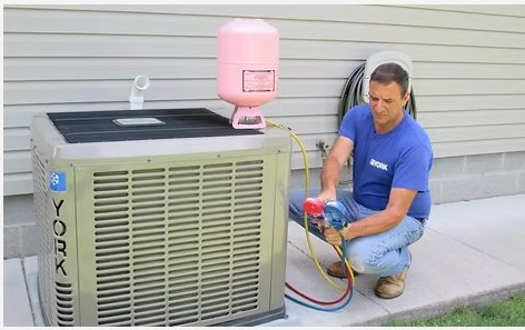 Joe Coppeta servicing an HVAC unit
